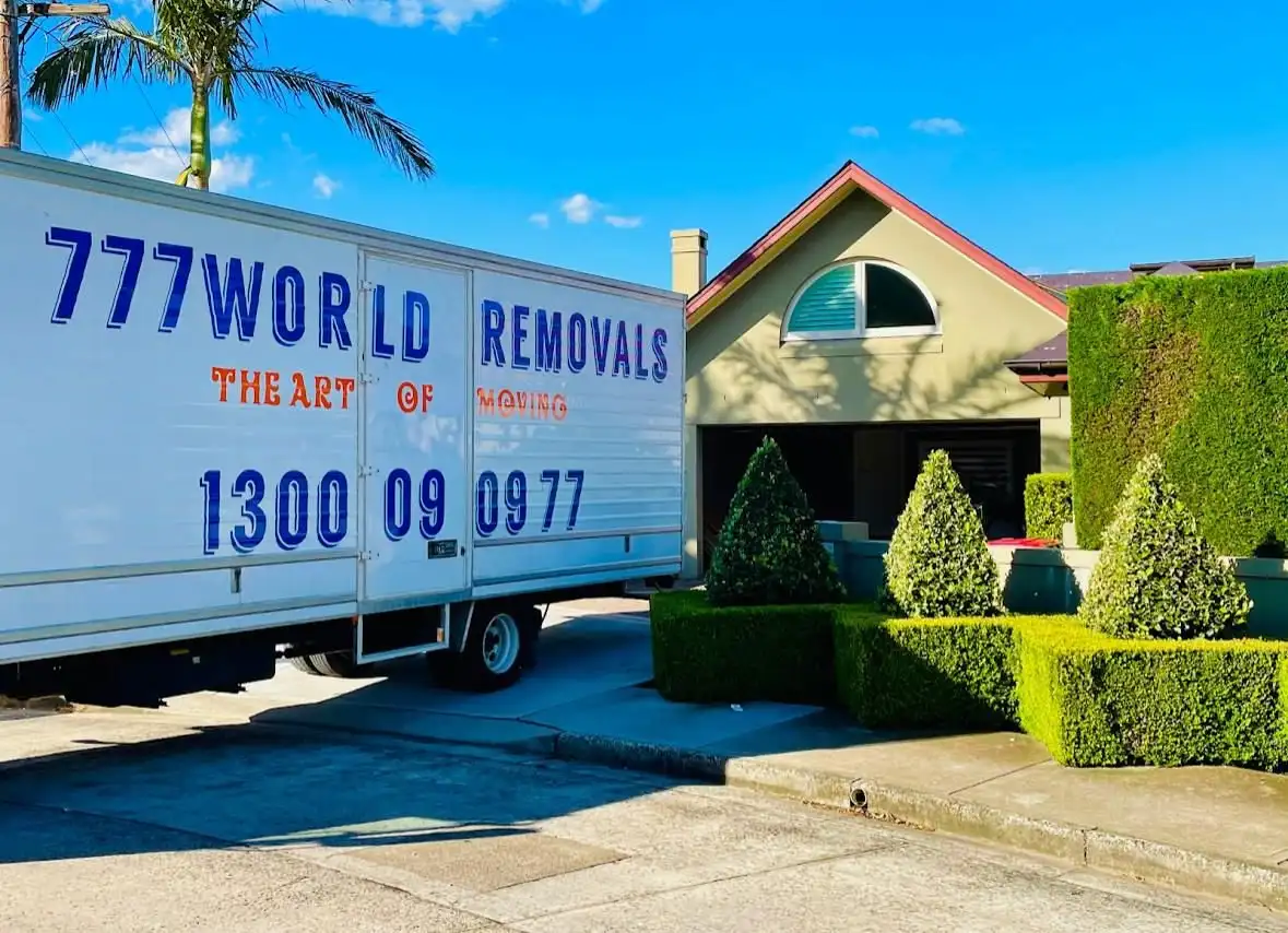 777 World Removals truck outside a Wollongong home