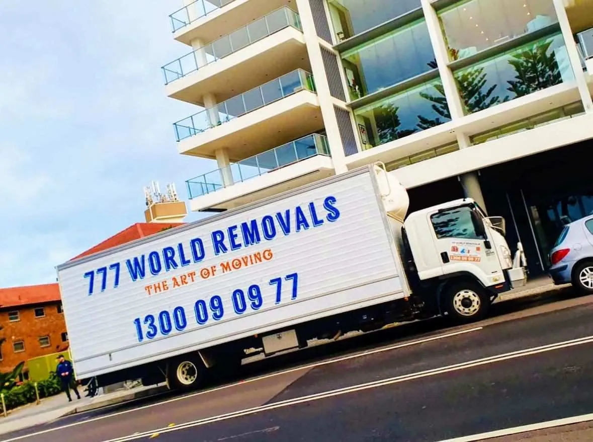 777 World Removals truck at a Wollongong apartment building