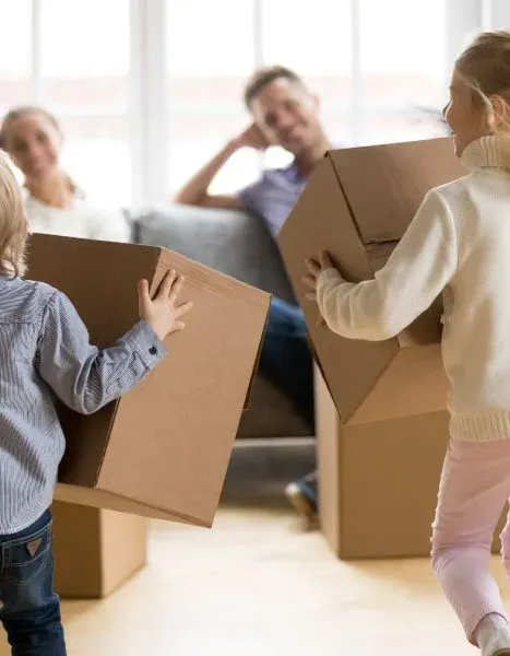 Family packing boxes for a Wollongong to Adelaide move